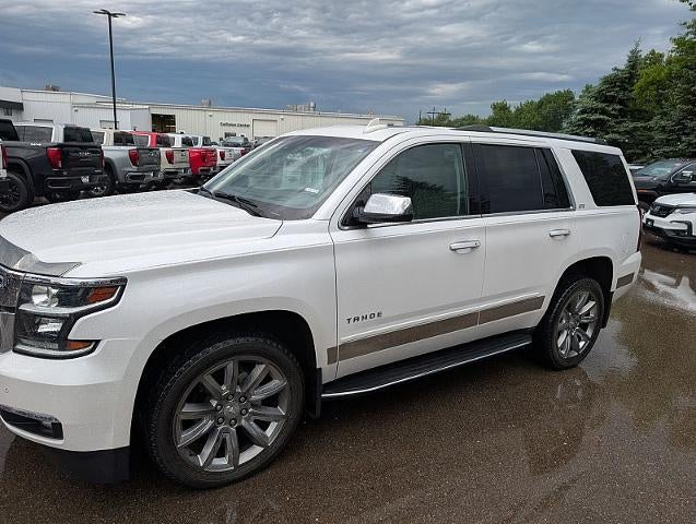 2016 Chevrolet Tahoe LTZ in Iridescent Pearl Tricoat — front three-quarter view